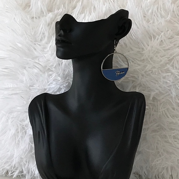 NWT Guess Silver Tone Hoop Earrings With Silver Cursive Logo On Blue Background - Picture 2 of 11